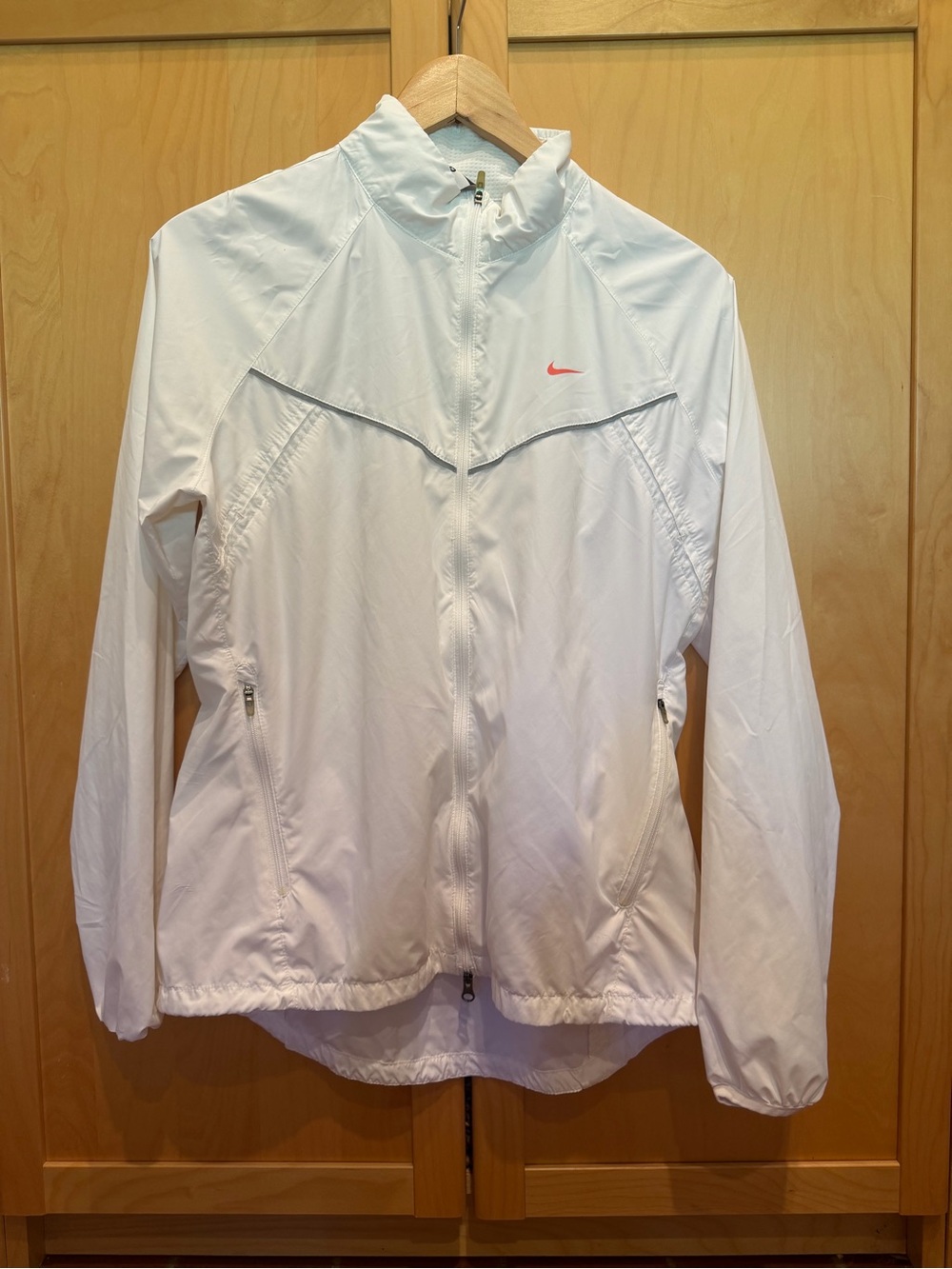Nike Women’s White Windbreaker Jacket with Pink Swoosh